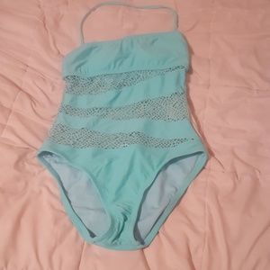 One-piece with cut-outs